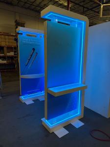 Custom Double-sided Workstation Kiosks with Shelves, Monitor Mount, Fabric Graphics, and RGB LED Accents Lights -- View 3